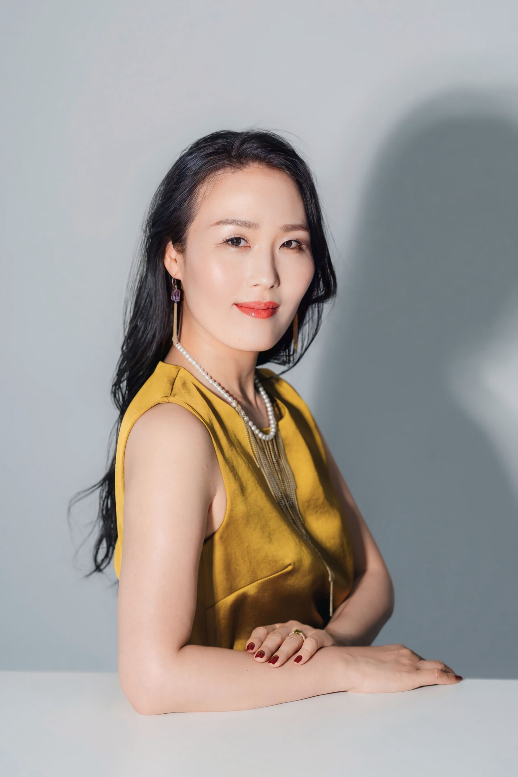 代表 万紀子